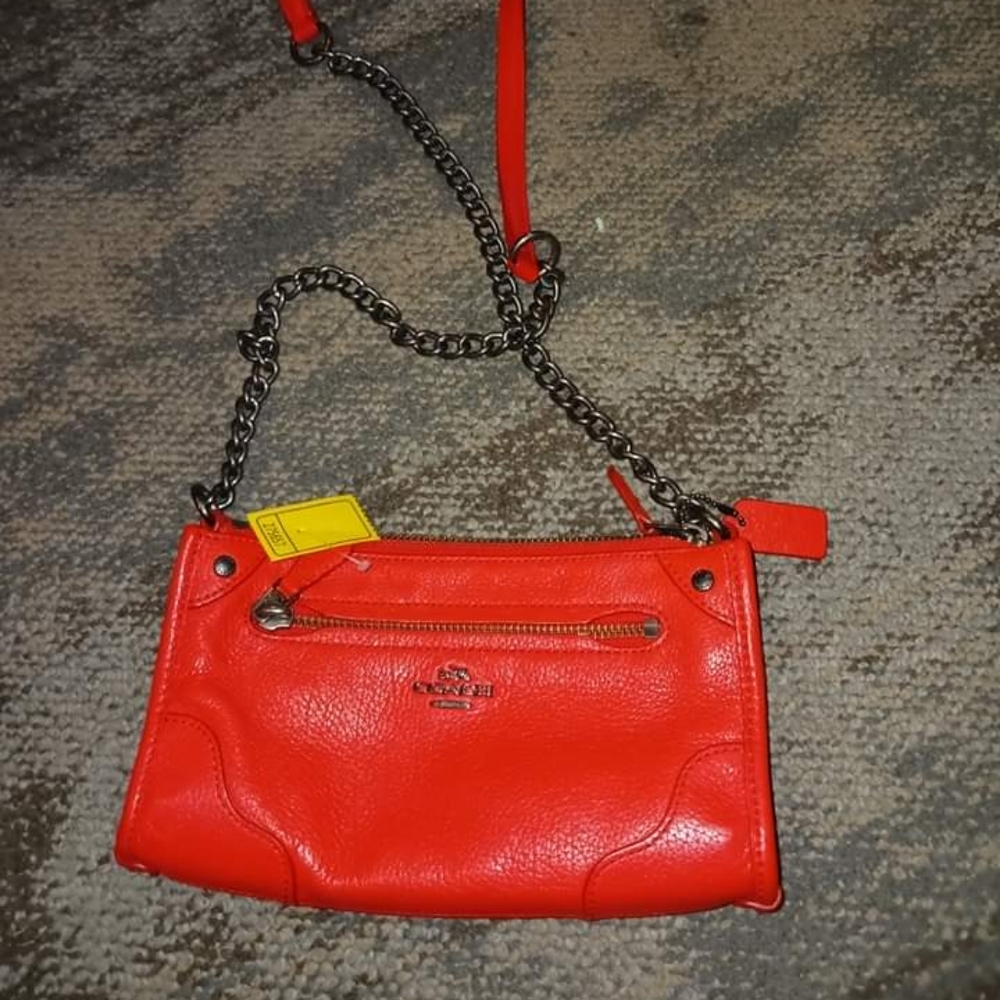 Bright orange coach crossbody